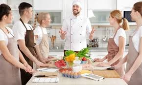 Chef teaching a hands-on cooking class